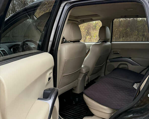 Черный Мицубиси Аутлендер, объемом двигателя 2.18 л и пробегом 233 тыс. км за 9600 $, фото 6 на Automoto.ua