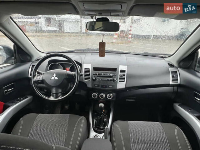 Мицубиси Аутлендер 2008 в Кременчуге на Automoto.ua Черный Мицубиси Аутлендер, объемом двигателя 2.4 л и пробегом 230 тыс. км за 6850 $, фото 47 на Automoto.ua