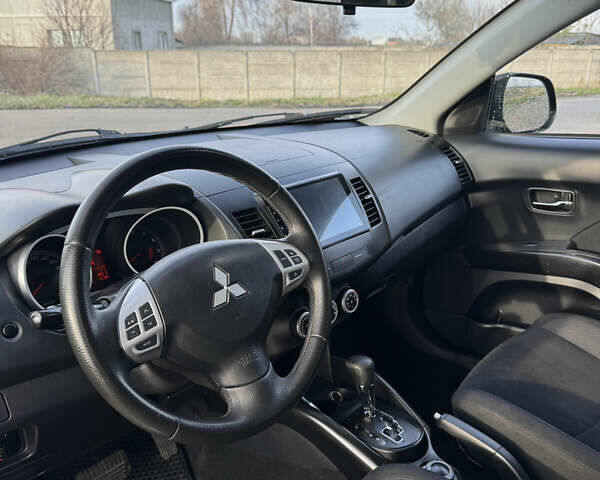 Чорний Міцубісі Аутлендер, об'ємом двигуна 2.36 л та пробігом 293 тис. км за 7900 $, фото 9 на Automoto.ua