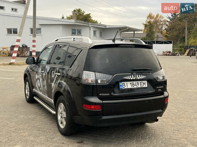 Мицубиси Аутлендер 2008 в Кременчуге на Automoto.ua Черный Мицубиси Аутлендер, объемом двигателя 2.4 л и пробегом 230 тыс. км за 6850 $, фото 10 на Automoto.ua