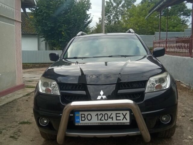 Чорний Міцубісі Аутлендер, об'ємом двигуна 2 л та пробігом 208 тис. км за 6700 $, фото 9 на Automoto.ua