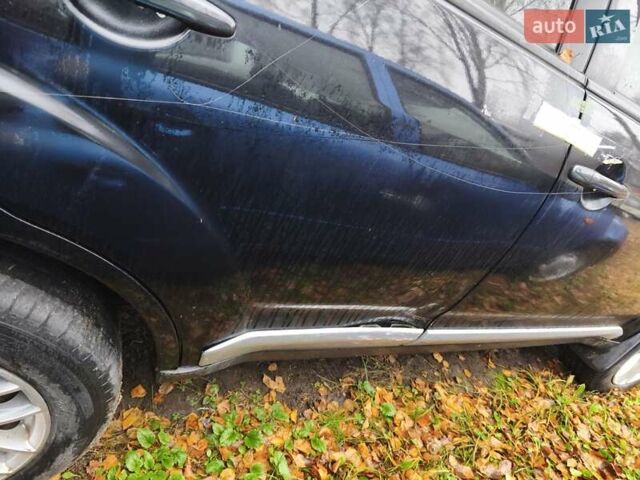 Чорний Міцубісі Аутлендер, об'ємом двигуна 2.4 л та пробігом 242 тис. км за 3400 $, фото 7 на Automoto.ua
