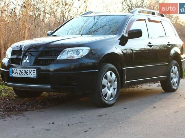 Черный Мицубиси Аутлендер, объемом двигателя 2 л и пробегом 189 тыс. км за 7200 $, фото 29 на Automoto.ua