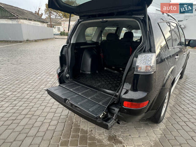 Черный Мицубиси Аутлендер, объемом двигателя 2.4 л и пробегом 230 тыс. км за 6650 $, фото 57 на Automoto.ua