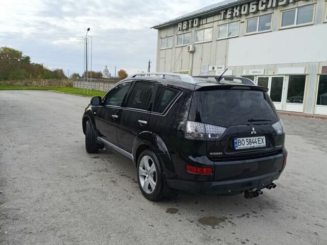 Черный Мицубиси Аутлендер, объемом двигателя 2.2 л и пробегом 200 тыс. км за 9500 $, фото 2 на Automoto.ua