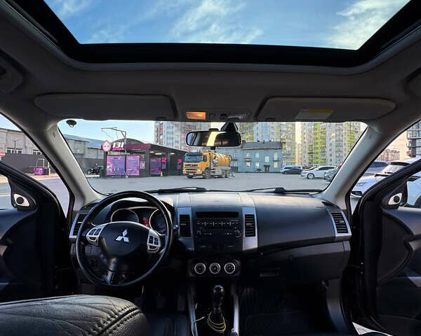 Черный Мицубиси Аутлендер, объемом двигателя 1.97 л и пробегом 202 тыс. км за 9700 $, фото 9 на Automoto.ua