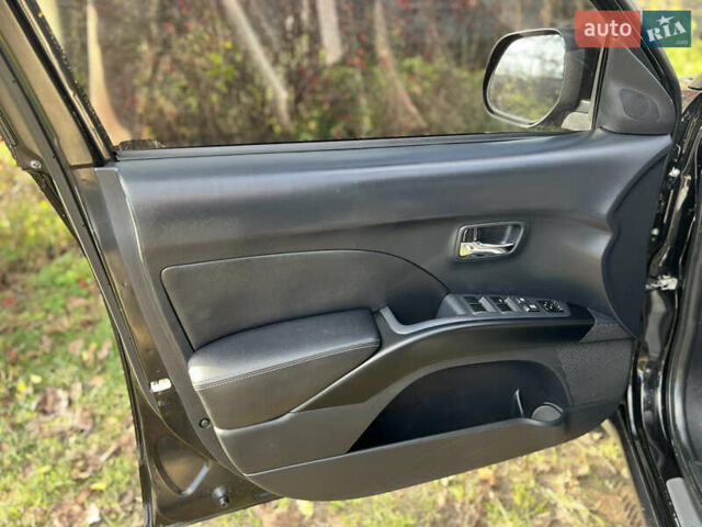 Чорний Міцубісі Аутлендер, об'ємом двигуна 2.4 л та пробігом 221 тис. км за 8900 $, фото 22 на Automoto.ua