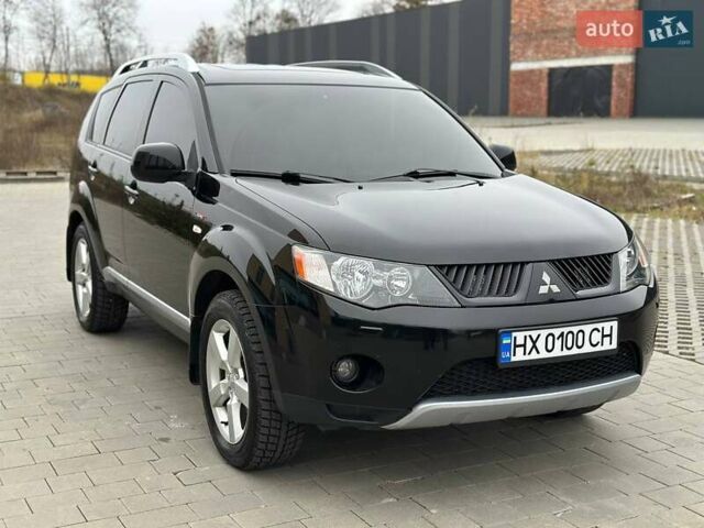 Черный Мицубиси Аутлендер, объемом двигателя 3 л и пробегом 248 тыс. км за 9800 $, фото 2 на Automoto.ua