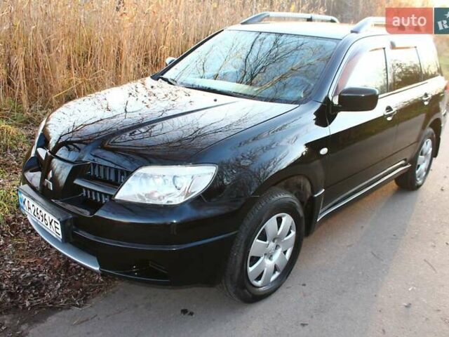 Черный Мицубиси Аутлендер, объемом двигателя 2 л и пробегом 189 тыс. км за 7200 $, фото 28 на Automoto.ua