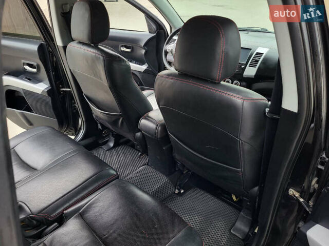 Чорний Міцубісі Аутлендер, об'ємом двигуна 2.4 л та пробігом 205 тис. км за 8400 $, фото 20 на Automoto.ua