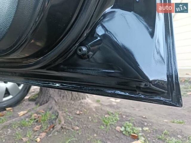 Черный Мицубиси Аутлендер, объемом двигателя 2 л и пробегом 190 тыс. км за 6900 $, фото 49 на Automoto.ua