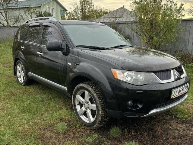 Чорний Міцубісі Аутлендер, об'ємом двигуна 2.4 л та пробігом 186 тис. км за 8700 $, фото 4 на Automoto.ua