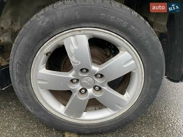 Черный Мицубиси Аутлендер, объемом двигателя 2 л и пробегом 306 тыс. км за 6500 $, фото 16 на Automoto.ua