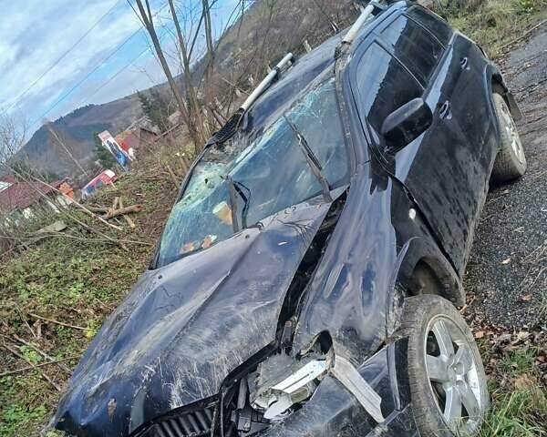 Черный Мицубиси Аутлендер, объемом двигателя 2.38 л и пробегом 270 тыс. км за 1700 $, фото 5 на Automoto.ua