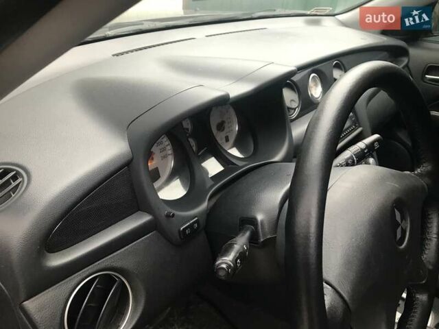 Чорний Міцубісі Аутлендер, об'ємом двигуна 2.38 л та пробігом 207 тис. км за 7000 $, фото 23 на Automoto.ua