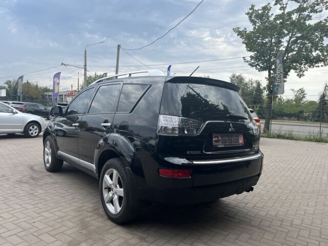 Черный Мицубиси Аутлендер, объемом двигателя 3 л и пробегом 235 тыс. км за 9800 $, фото 5 на Automoto.ua