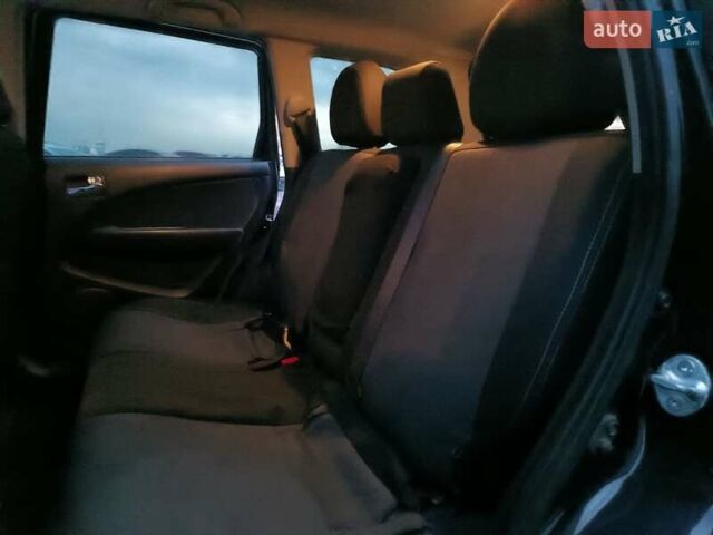 Чорний Міцубісі Аутлендер, об'ємом двигуна 2 л та пробігом 271 тис. км за 6940 $, фото 32 на Automoto.ua