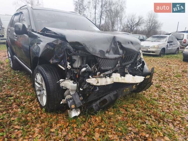 Чорний Міцубісі Аутлендер, об'ємом двигуна 2.4 л та пробігом 242 тис. км за 3400 $, фото 2 на Automoto.ua