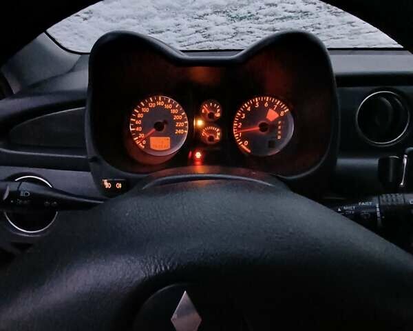 Черный Мицубиси Аутлендер, объемом двигателя 2.4 л и пробегом 270 тыс. км за 6700 $, фото 6 на Automoto.ua