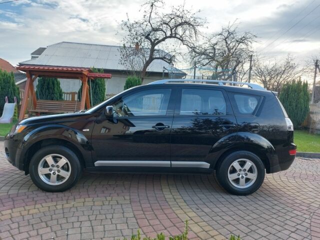 Черный Мицубиси Аутлендер, объемом двигателя 2 л и пробегом 249 тыс. км за 8750 $, фото 3 на Automoto.ua