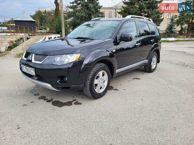 Чорний Міцубісі Аутлендер, об'ємом двигуна 2.4 л та пробігом 205 тис. км за 8400 $, фото 9 на Automoto.ua