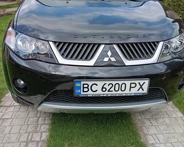 Черный Мицубиси Аутлендер, объемом двигателя 2.35 л и пробегом 245 тыс. км за 8000 $, фото 17 на Automoto.ua