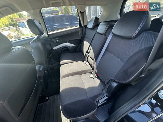 Черный Мицубиси Аутлендер, объемом двигателя 2 л и пробегом 240 тыс. км за 10999 $, фото 24 на Automoto.ua