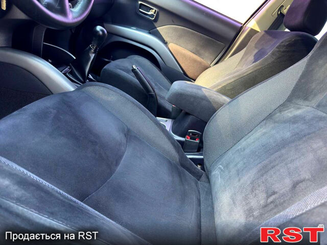 Чорний Міцубісі Аутлендер, об'ємом двигуна 2.4 л та пробігом 171 тис. км за 8999 $, фото 8 на Automoto.ua