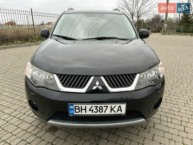 Черный Мицубиси Аутлендер, объемом двигателя 3 л и пробегом 77 тыс. км за 11800 $, фото 7 на Automoto.ua