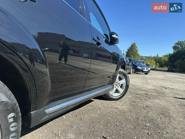 Черный Мицубиси Аутлендер, объемом двигателя 2 л и пробегом 240 тыс. км за 10999 $, фото 18 на Automoto.ua