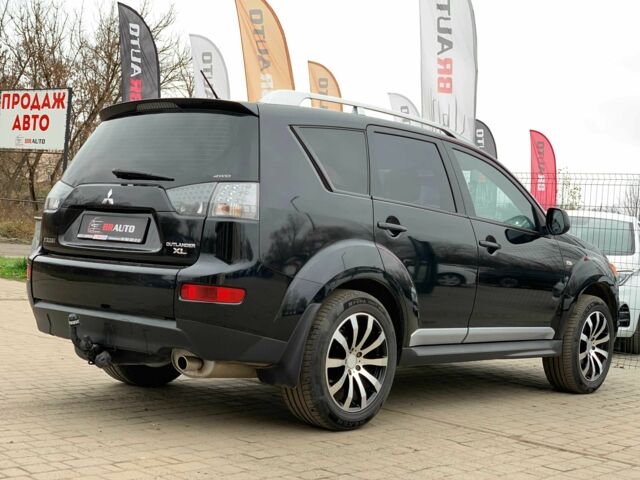 Черный Мицубиси Аутлендер, объемом двигателя 2.4 л и пробегом 175 тыс. км за 10499 $, фото 4 на Automoto.ua