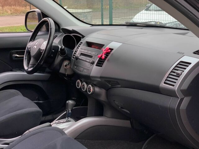 Черный Мицубиси Аутлендер, объемом двигателя 2.4 л и пробегом 175 тыс. км за 10499 $, фото 14 на Automoto.ua