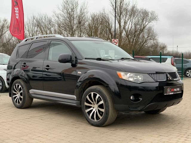 Черный Мицубиси Аутлендер, объемом двигателя 2.4 л и пробегом 175 тыс. км за 10499 $, фото 2 на Automoto.ua
