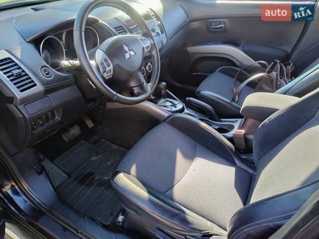 Міцубісі Аутлендер 2009 у Житомирі на Automoto.ua Чорний Міцубісі Аутлендер, об'ємом двигуна 2 л та пробігом 251 тис. км за 8400 $, фото 5 на Automoto.ua