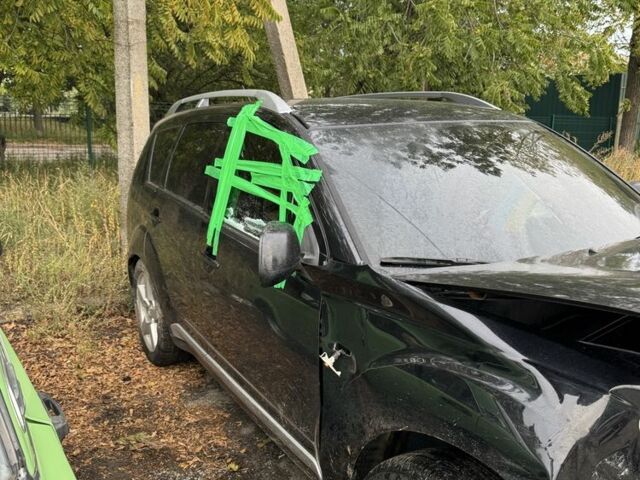 Черный Мицубиси Аутлендер, объемом двигателя 2.4 л и пробегом 246 тыс. км за 2600 $, фото 6 на Automoto.ua