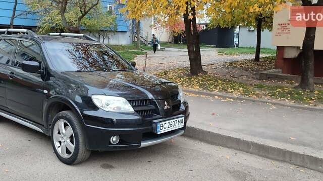 Чорний Міцубісі Аутлендер, об'ємом двигуна 2 л та пробігом 160 тис. км за 8500 $, фото 15 на Automoto.ua