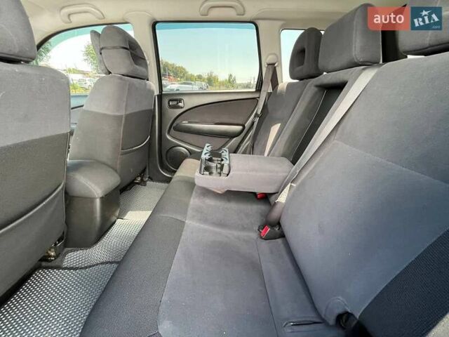 Черный Мицубиси Аутлендер, объемом двигателя 2 л и пробегом 236 тыс. км за 6699 $, фото 13 на Automoto.ua