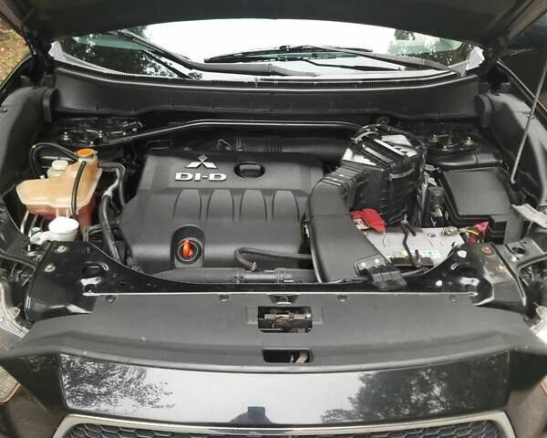 Чорний Міцубісі Аутлендер, об'ємом двигуна 2 л та пробігом 220 тис. км за 10700 $, фото 7 на Automoto.ua