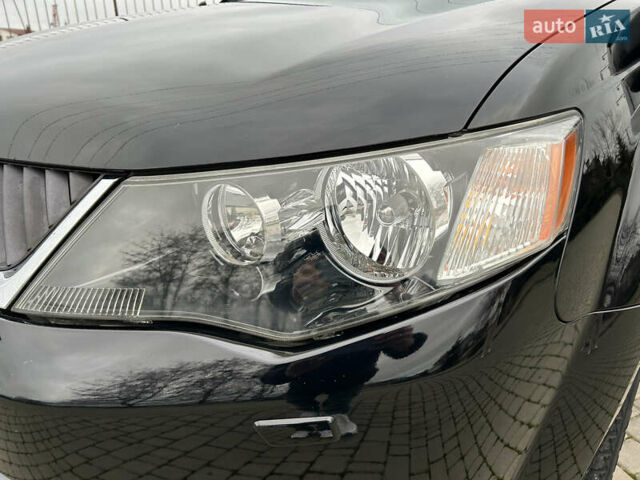 Черный Мицубиси Аутлендер, объемом двигателя 3 л и пробегом 77 тыс. км за 11800 $, фото 26 на Automoto.ua