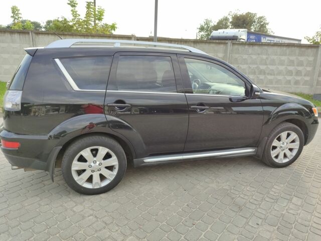 Черный Мицубиси Аутлендер, объемом двигателя 2 л и пробегом 104 тыс. км за 9900 $, фото 6 на Automoto.ua