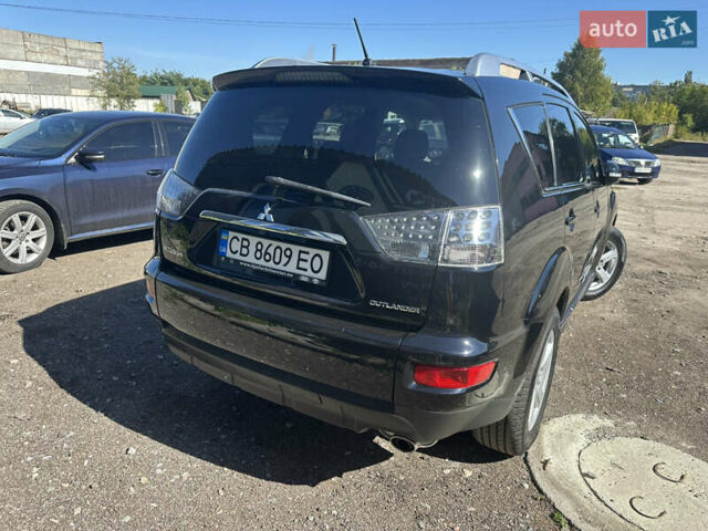 Черный Мицубиси Аутлендер, объемом двигателя 2 л и пробегом 240 тыс. км за 10999 $, фото 9 на Automoto.ua