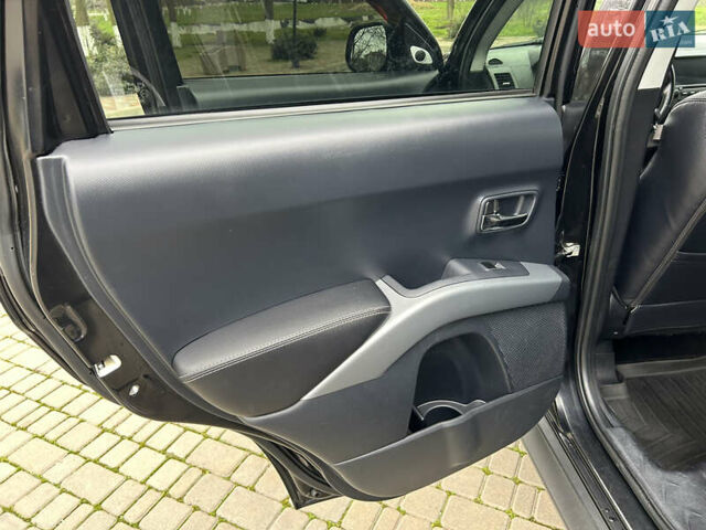 Черный Мицубиси Аутлендер, объемом двигателя 3 л и пробегом 77 тыс. км за 11800 $, фото 13 на Automoto.ua