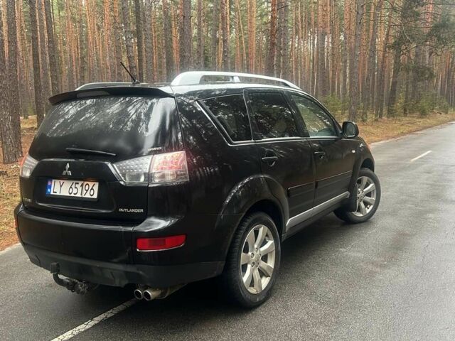 Черный Мицубиси Аутлендер, объемом двигателя 2 л и пробегом 280 тыс. км за 4500 $, фото 4 на Automoto.ua