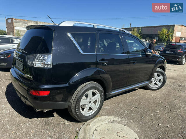 Черный Мицубиси Аутлендер, объемом двигателя 2 л и пробегом 240 тыс. км за 10999 $, фото 12 на Automoto.ua