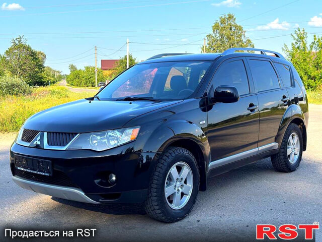 Чорний Міцубісі Аутлендер, об'ємом двигуна 2.4 л та пробігом 171 тис. км за 8999 $, фото 2 на Automoto.ua