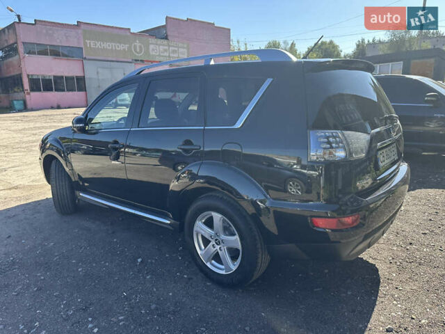 Черный Мицубиси Аутлендер, объемом двигателя 2 л и пробегом 240 тыс. км за 10999 $, фото 7 на Automoto.ua