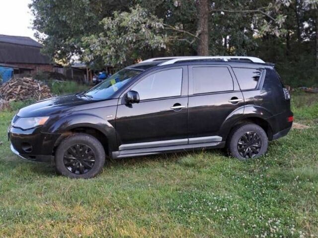 Чорний Міцубісі Аутлендер, об'ємом двигуна 2 л та пробігом 259 тис. км за 3900 $, фото 3 на Automoto.ua