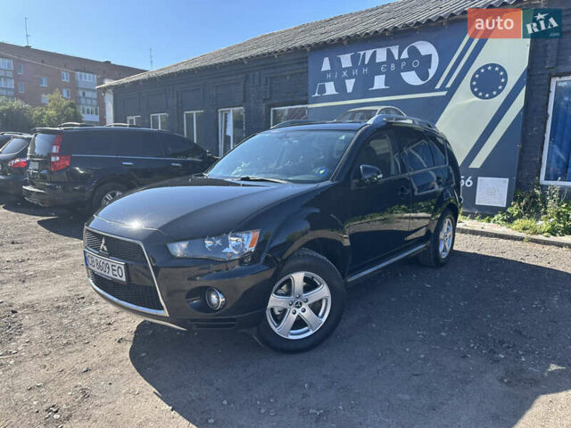 Черный Мицубиси Аутлендер, объемом двигателя 2 л и пробегом 240 тыс. км за 10999 $, фото 2 на Automoto.ua