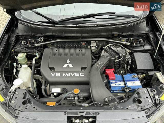 Черный Мицубиси Аутлендер, объемом двигателя 3 л и пробегом 77 тыс. км за 11800 $, фото 25 на Automoto.ua