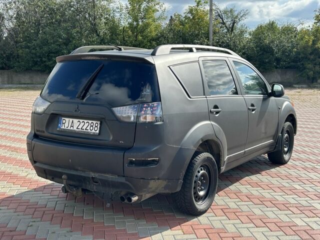 Чорний Міцубісі Аутлендер, об'ємом двигуна 2 л та пробігом 250 тис. км за 2750 $, фото 4 на Automoto.ua